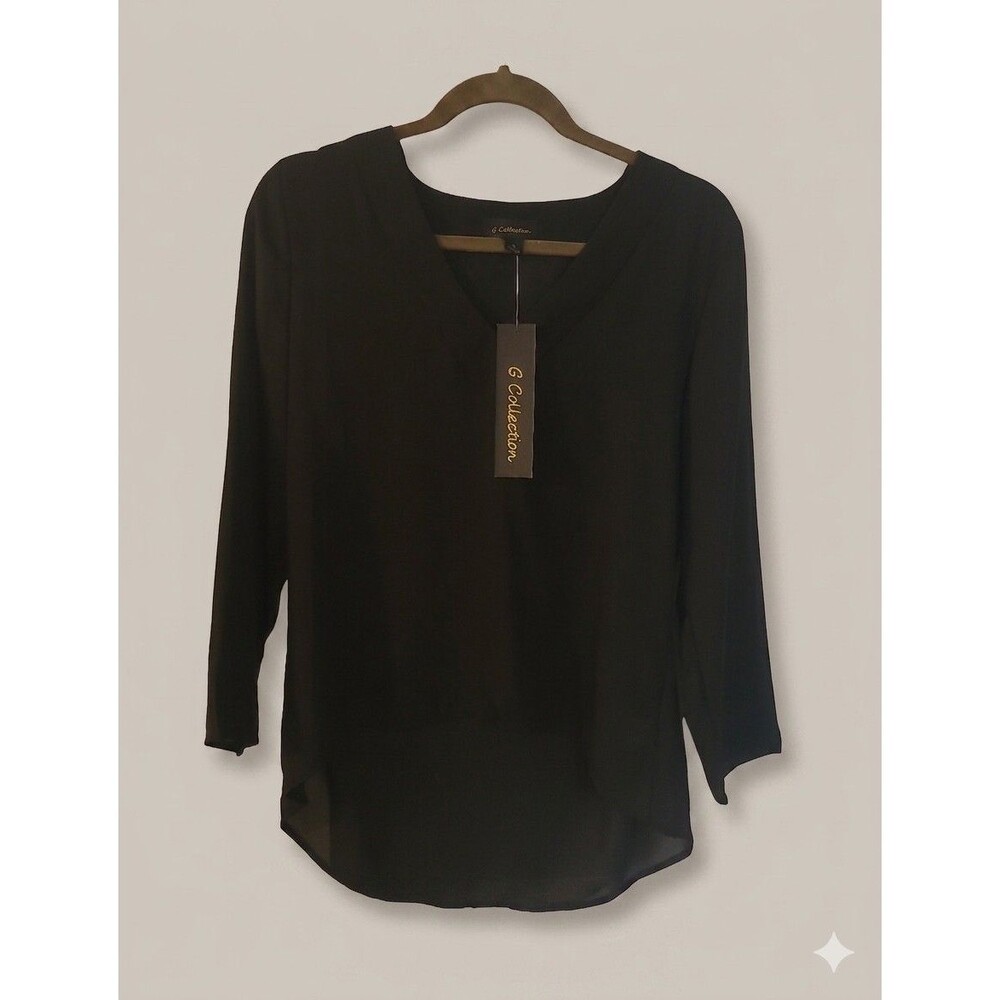 New G Collection black blouse features a v-neckline and a high-low hem Sz S
